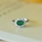 An Exquisite Sterling Silver Inlaid Jadeite Ring