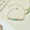 An Exquisite Sterling Silver Inlaid Jadeite Bracelet