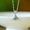 An Exquisite Sterling Silver Inlaid Jadeite Pendant
