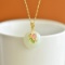 An Exquisite Sterling Silver-Gold Plated Inlaid White Jade Pendant