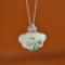 An Exquisite Sterling Silver Inlaid White Jade Pendant