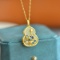 An Exquisite Sterling Silver-Gold Plated Inlaid White Jade Pendant