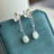 A Pair of Exquisite Sterling Silver Inlaid White Jade Earrings