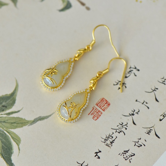 A Pair of Exquisite Sterling Silver-Gold Plated Inlaid White Jade Earrings