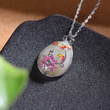 Exquisite Sterling Silver Inlaid White Jade Pendant