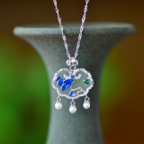 An Exquisite Sterling Silver Inlaid White Jade Pendant