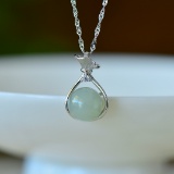 An Exquisite Sterling Silver Inlaid Jade Pendant