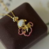 An Exquisite Sterling Silver-Gold Plated Inlaid White Jade Pendant