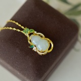 An Exquisite Sterling Silver-Gold Plated Inlaid White Jade Pendant