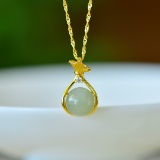 An Exquisite Sterling Silver-Gold Plated Inlaid Jade Pendant