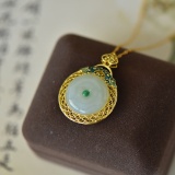 An Exquisite Sterling Silver-Gold Plated Inlaid White Jade Pendant