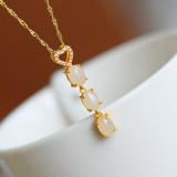 Exquisite Sterling Silver-Gold Plated Inlaid White Jade Pendant