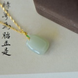 An Exquisite Sterling Silver-Gold Plated Inlaid Jade Pendant