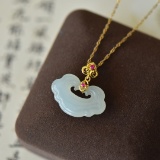 An Exquisite Sterling Silver-Gold Plated Inlaid White Jade Pendant