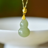 An Exquisite Sterling Silver-Gold Plated Inlaid Yellow Jade Pendant