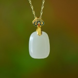 An Exquisite Sterling Silver-Gold Plated Inlaid White Jade Pendant