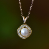 An Exquisite Sterling Silver-Gold Plated Inlaid Pearl Pendant