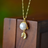An Exquisite Sterling Silver-Gold Plated Inlaid Pearl Pendant