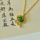 An Exquisite Sterling Silver-Gold Plated Inlaid Jasper Pendant