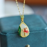An Exquisite Sterling Silver-Gold Plated Inlaid White Jade Pendant