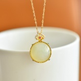 An Exquisite Sterling Silver-Gold Plated Inlaid White Jade Pendant