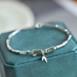 An Exquisite Sterling Silver Inlaid Jasper Bangle