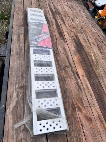 SET OF NEW/UNUSED CARRY-ON ALUM RAMPS,