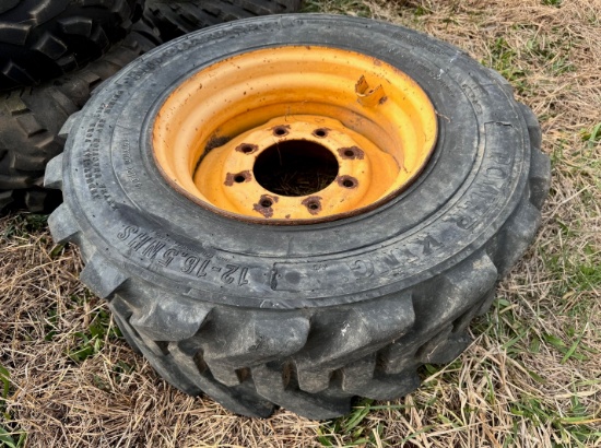 POWER KING SKID STEER TIRE AND RIM,
