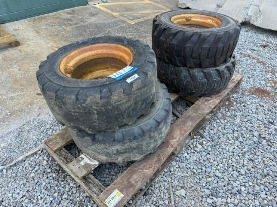 QTY (4) SKID STEER TIRES & RIMS