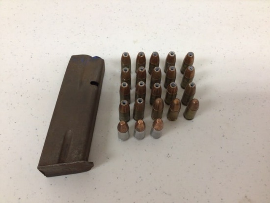 Mixed lot 9mm ammo and one magazine, 23rounds