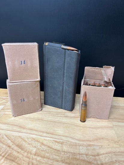 7.62 magazine and 45 bullets