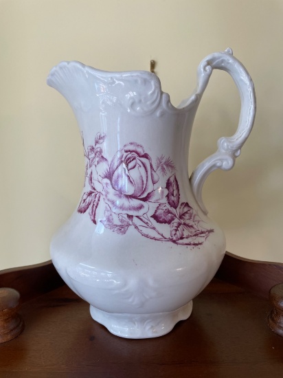 White Ceramic Pitcher With Floral Design and Scalloped Rim