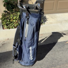 Callaway XT golf clubs paired with a TaylorMade stand bag