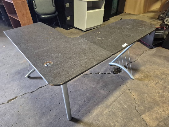 L-Shaped Office Desk with Gray Metal Frame and Black Laminate Top