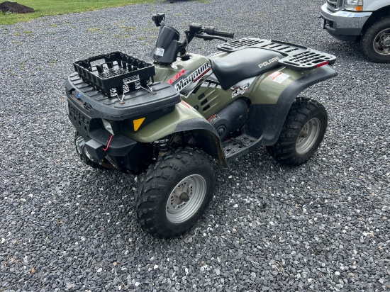 Polaris 330 magnum, comes with working winch, and snow blade, 4 wheel drive, has 243 hours, 456 mile