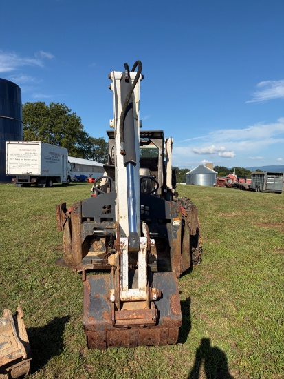 Bobcat 873, with a 8709 backhoe attachment,