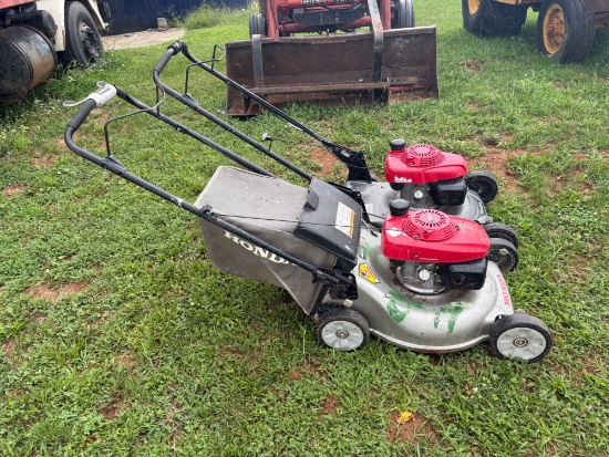Two push mowers