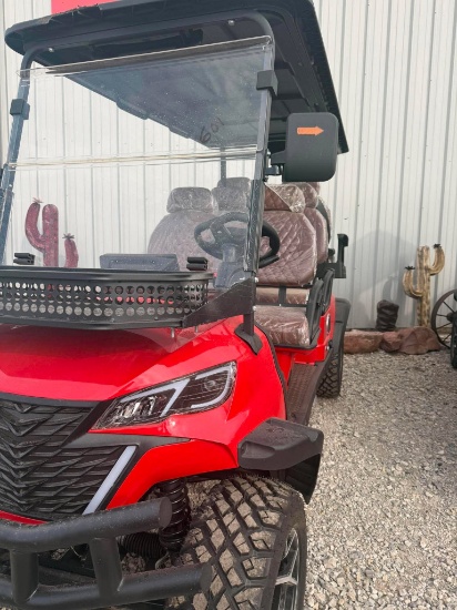 Red 6 seater golf cart