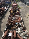 Row of Pallets of Misc Tong Jaws, Tong Parts, Elevator Bodies & Casing Tools