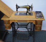 ANTIQUE SEWING MACHINE AND CABINET!