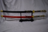 DISTINGUISHED RED AND BLACK DRAGONS HEAD SWORDS!