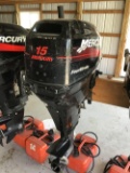 Late model Mercury 15 hp.  Four stroke outboard engines with remote tank