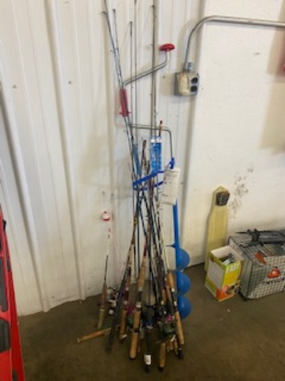 Group of fishing poles and a screw in auger