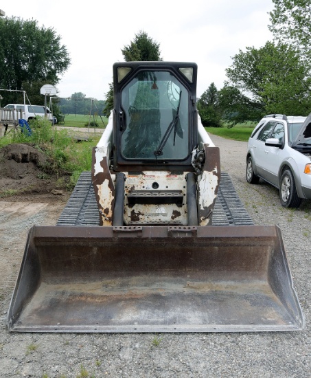 Bobcat T250 Turbo Hi Flo skidloader on tracks, 3256 hours with 80" materials bucket, year round cab