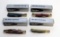 (4) KA-BAR FOLDING, VERY COLORED, STAG HANDLED FOLDING KNIVES, W/ 4, 3, 2,