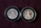(2) SILVER COMMEMORATIVE HALF DOLLARS