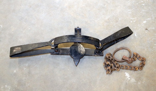 Newhouse Oneida slick pan leghold, double spring bear trap with no teeth, and chain not original