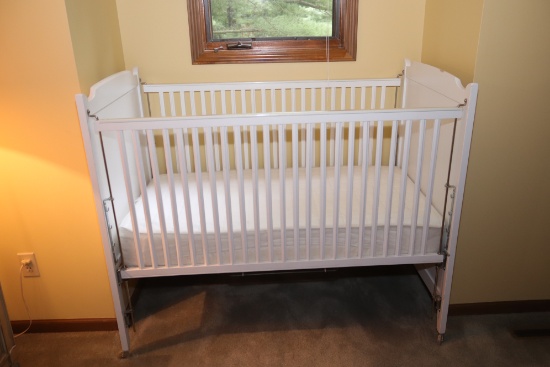 Baby crib including mattress