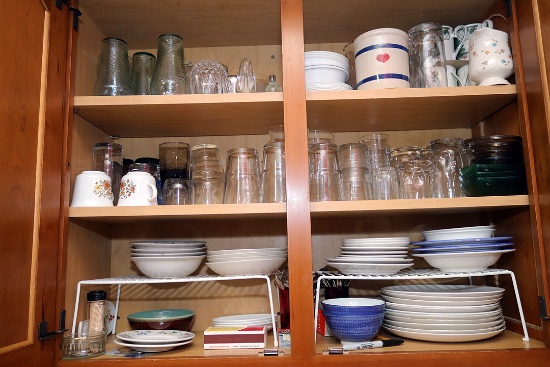 Contents of kitchen cupboards on south wall: cookbooks, thermoses, silverware, misc. glassware and d