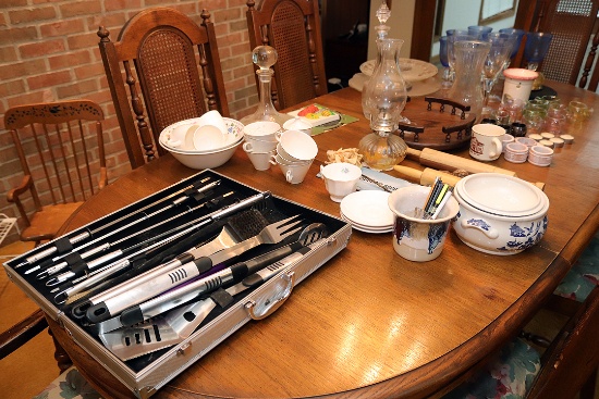 All items on dining room table: grill set, napkin rings, stemware, decanters, cake plates and misc. 